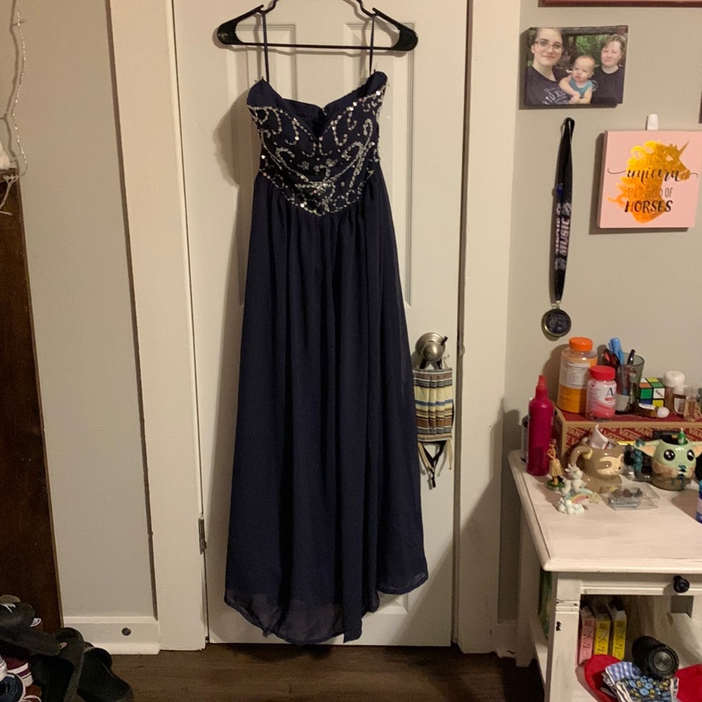 Navy blue prom dress with corset back and sweet heart neck line. Size 16.